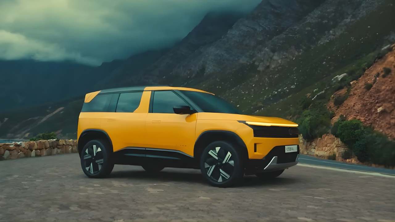 2025 Tata Sierra SUV front and side view showcasing its modern design, LED headlights, and bold stance ahead of India launch in November 2025.