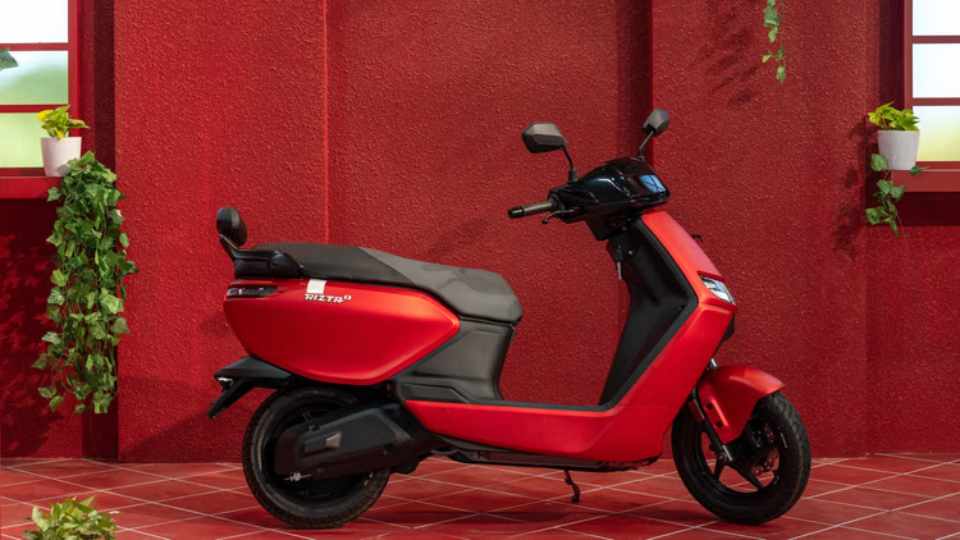 Ather Rizta electric scooter celebrating 2 lakh sales milestone in India at showroom