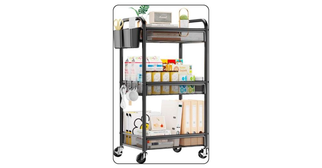 Black three tier metal rolling cart beside college dorm desk with school supplies on top snacks in middle and books on bottom tier