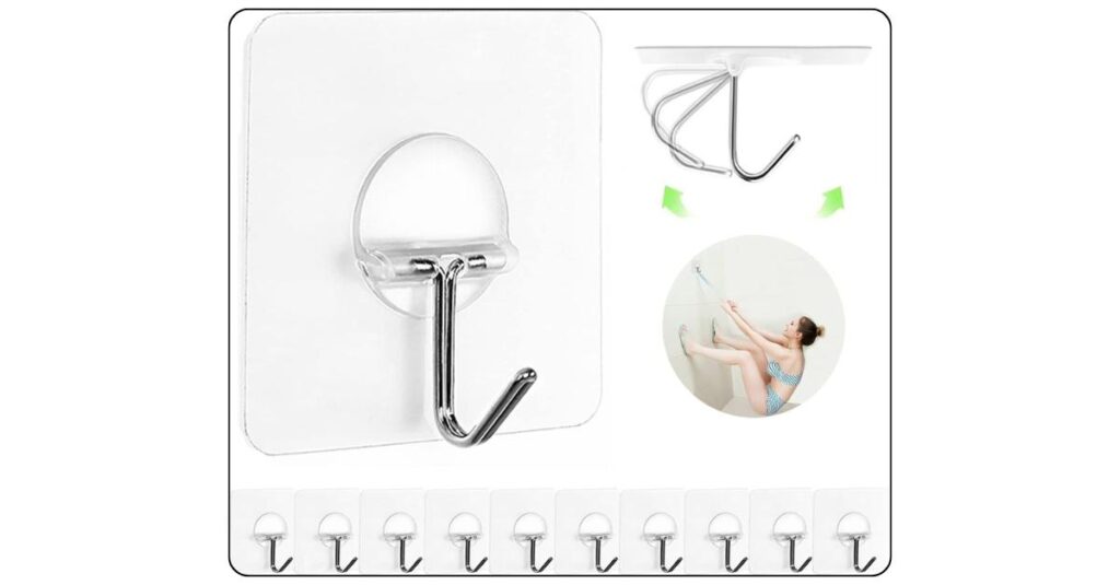 Three transparent adhesive wall hooks on dorm room wall near door with backpack on one hook headphones on another and tote bag on third